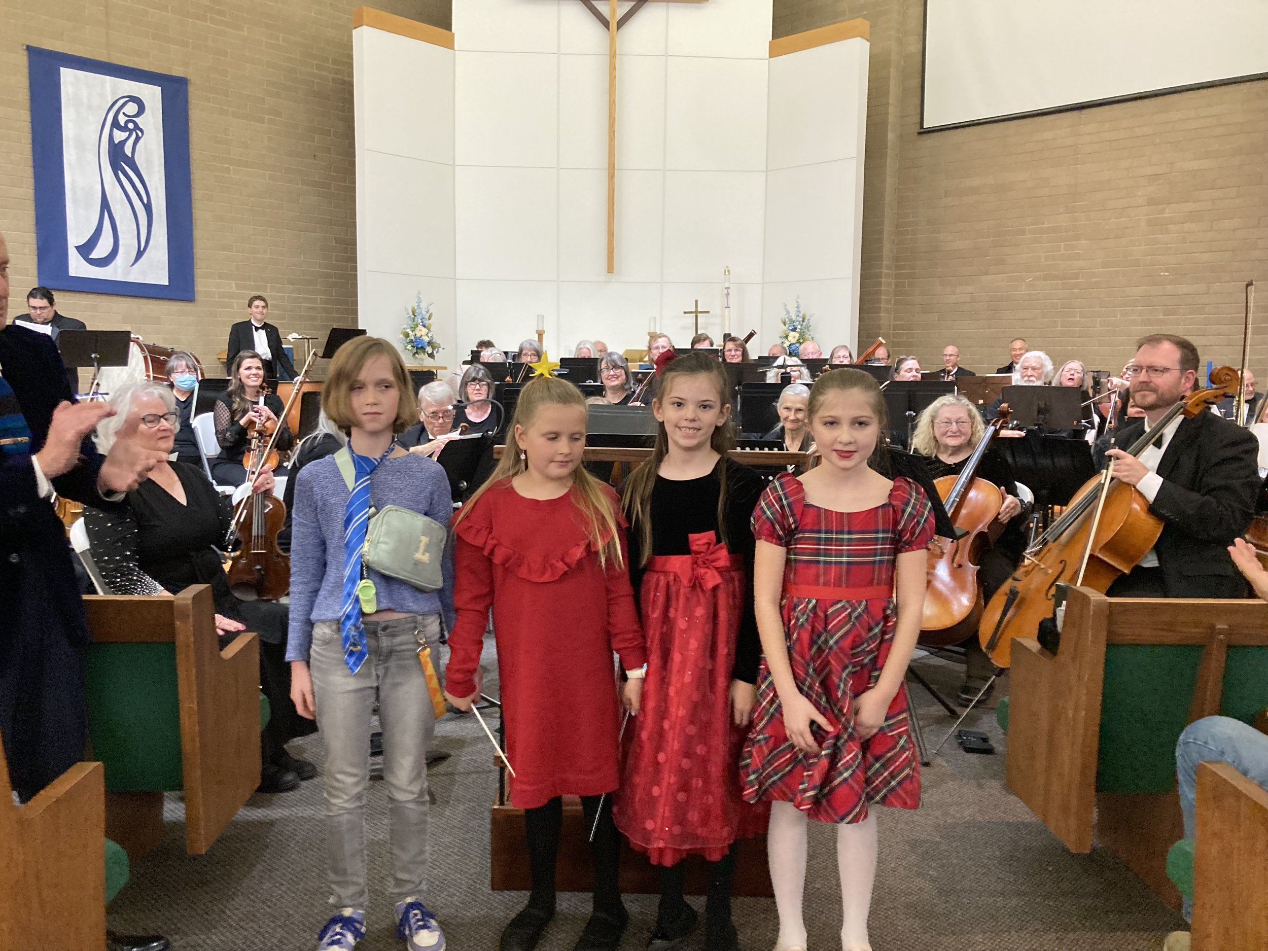 Youth guest conductors for December 2025 concert.