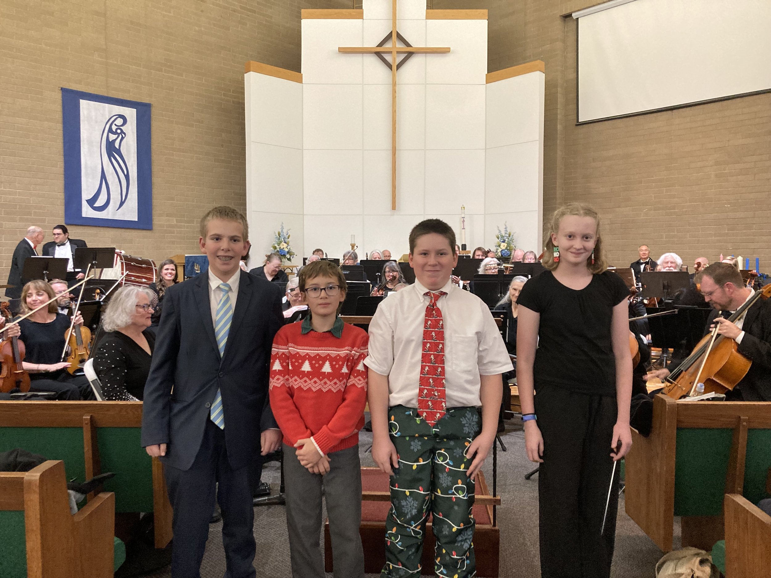 Youth guest conductors for December 2025 concert.