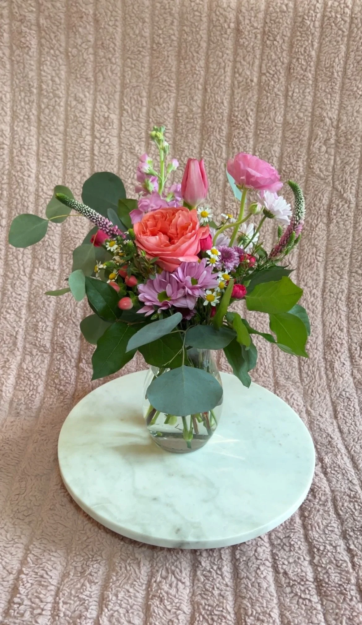 $80 + tax arrangement