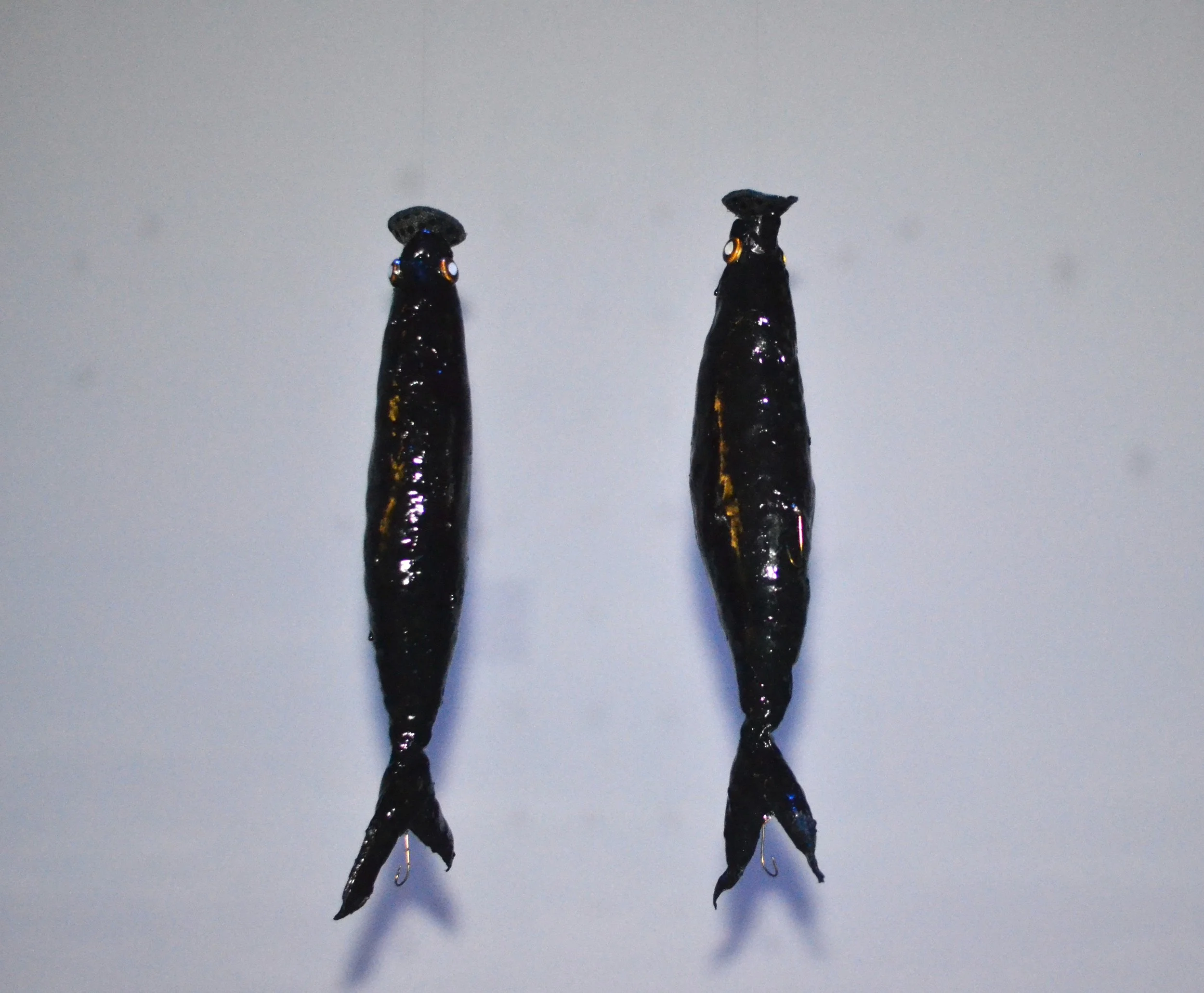 Soft Bait / 2019 / 20" x 4" / Gelatin, ink, fish hook, nipple pasties, taxidermy fish eyes, fishing line