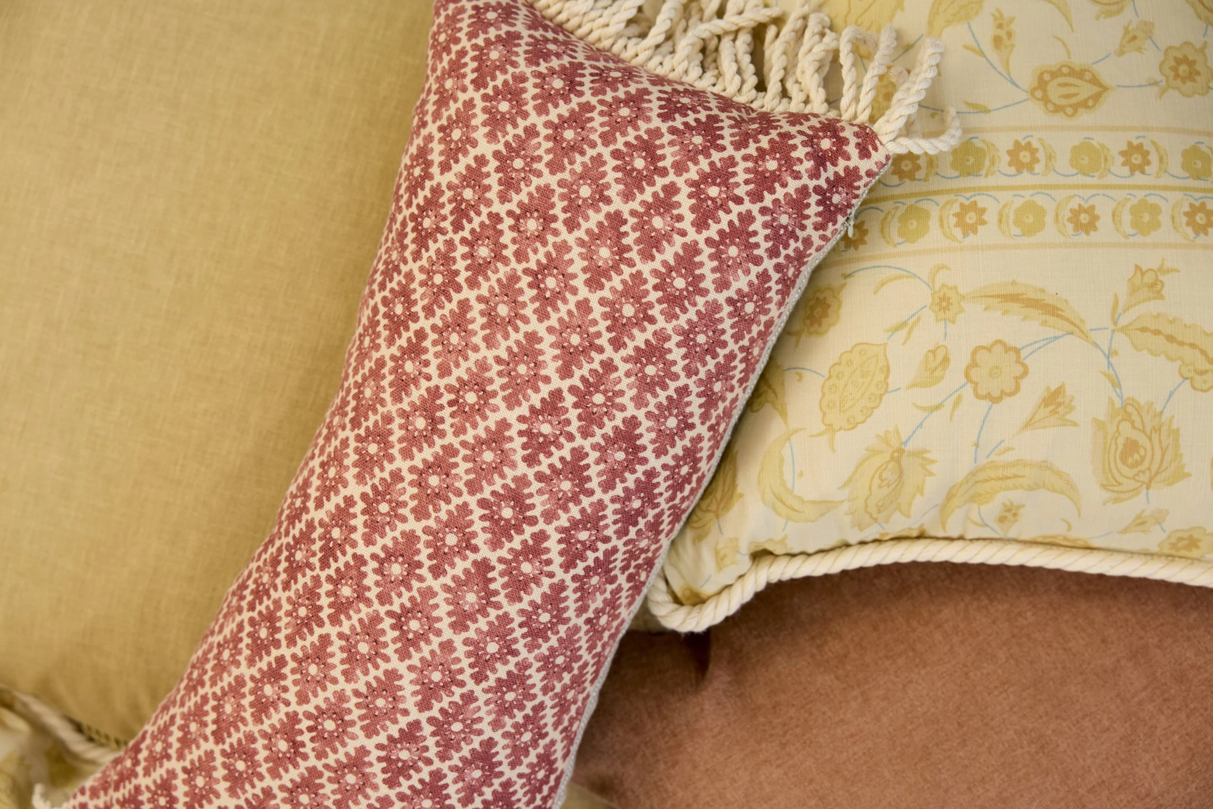 bonbon-cushion-rust-natural-bullion-fringe.jpg