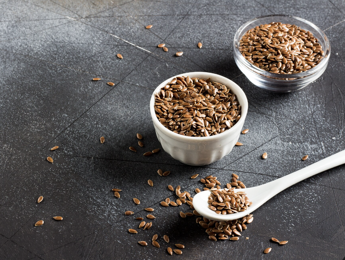 tiny bowl with flaxseed spoon