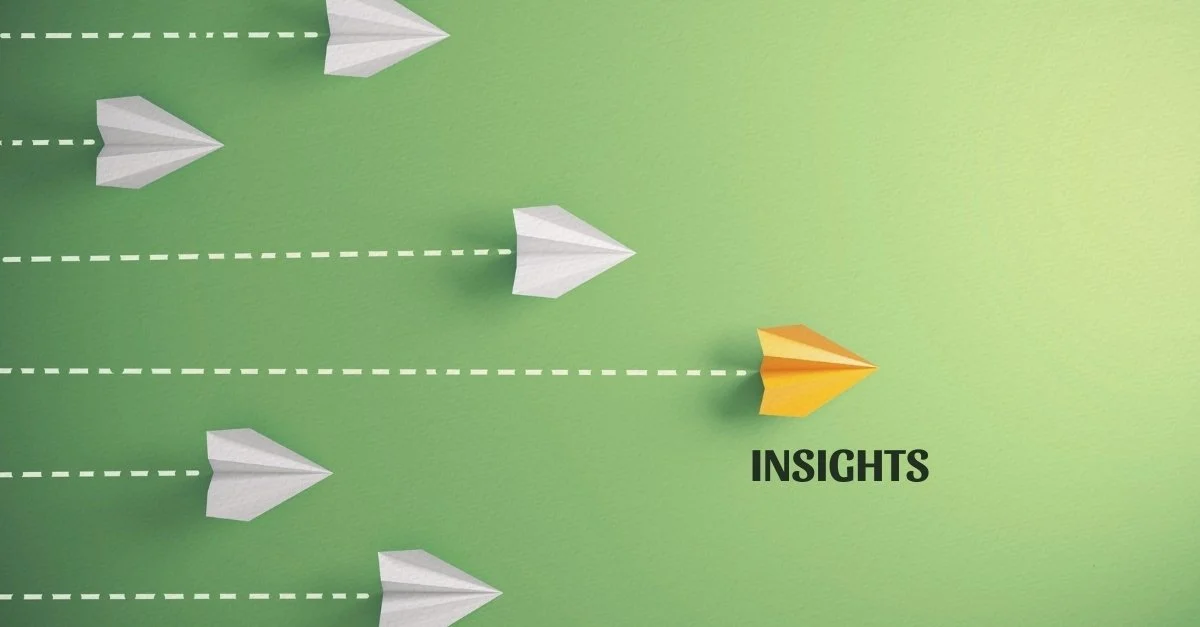 Several paper airplanes in white flying in a formation, with one orange paper airplane ahead labeled 'INSIGHTS,' indicating it leads to understanding or knowledge.