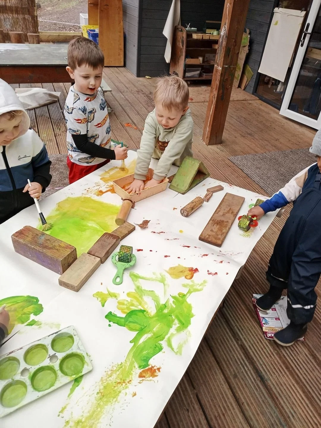 3-5 painting outside.jpg