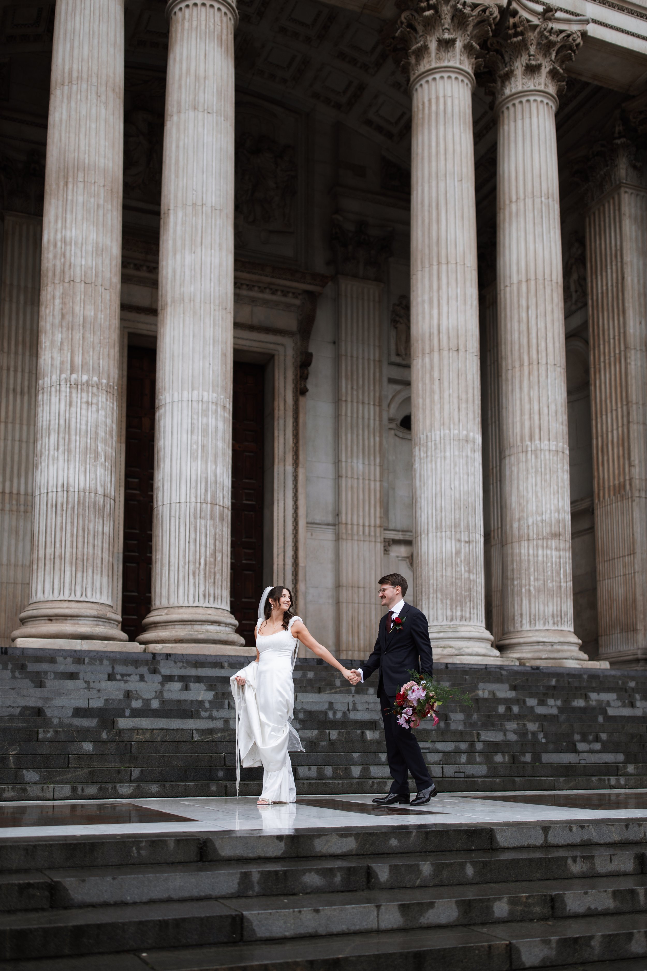 Bride and groom outside St Paul's Cathedral in London