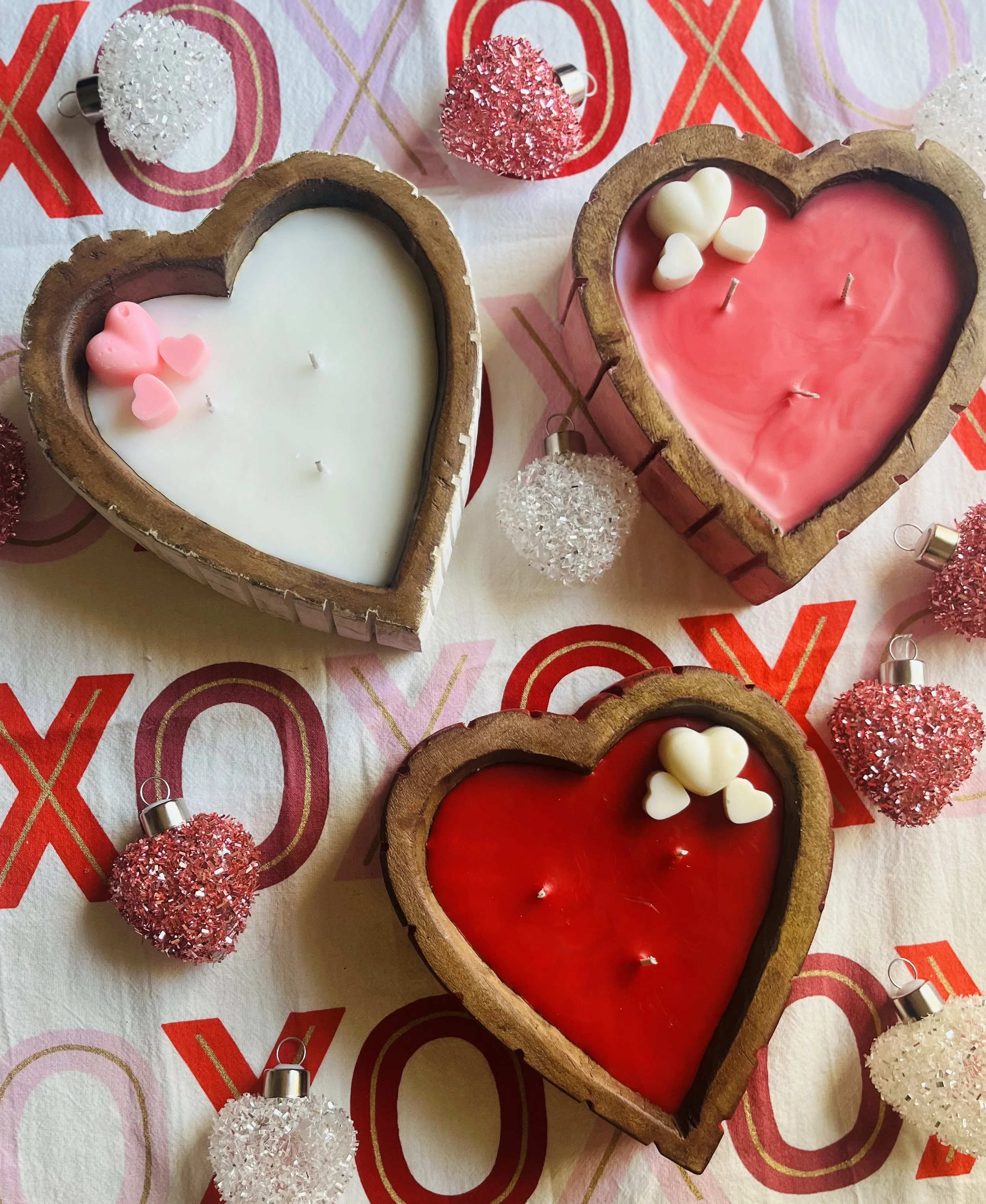 rustic heart shaped bowl with various candle scents