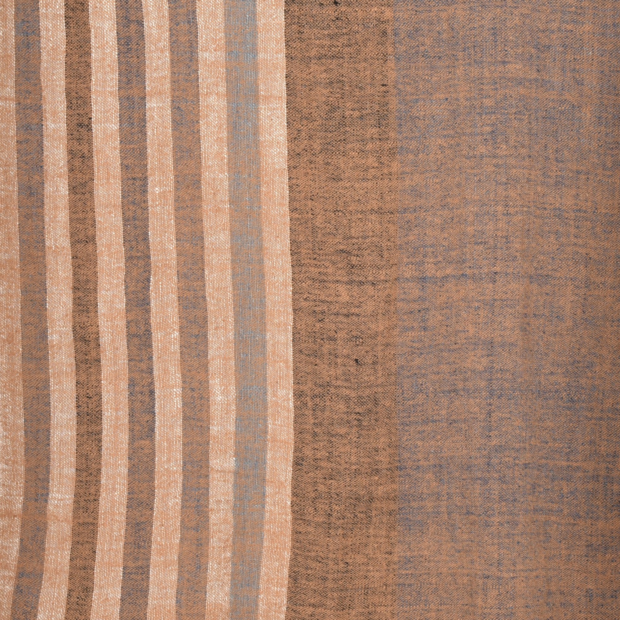 Hand-spun, hand-dyed, and hand-woven shawl made from thick organic cotton, featuring stripes in brown, tan, indigo, black, and white, with tassels at both ends. The shawl measures 2m x 70cm.