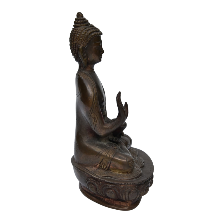 Antique brass Medicine Buddha statue 18cm tall facing west.png