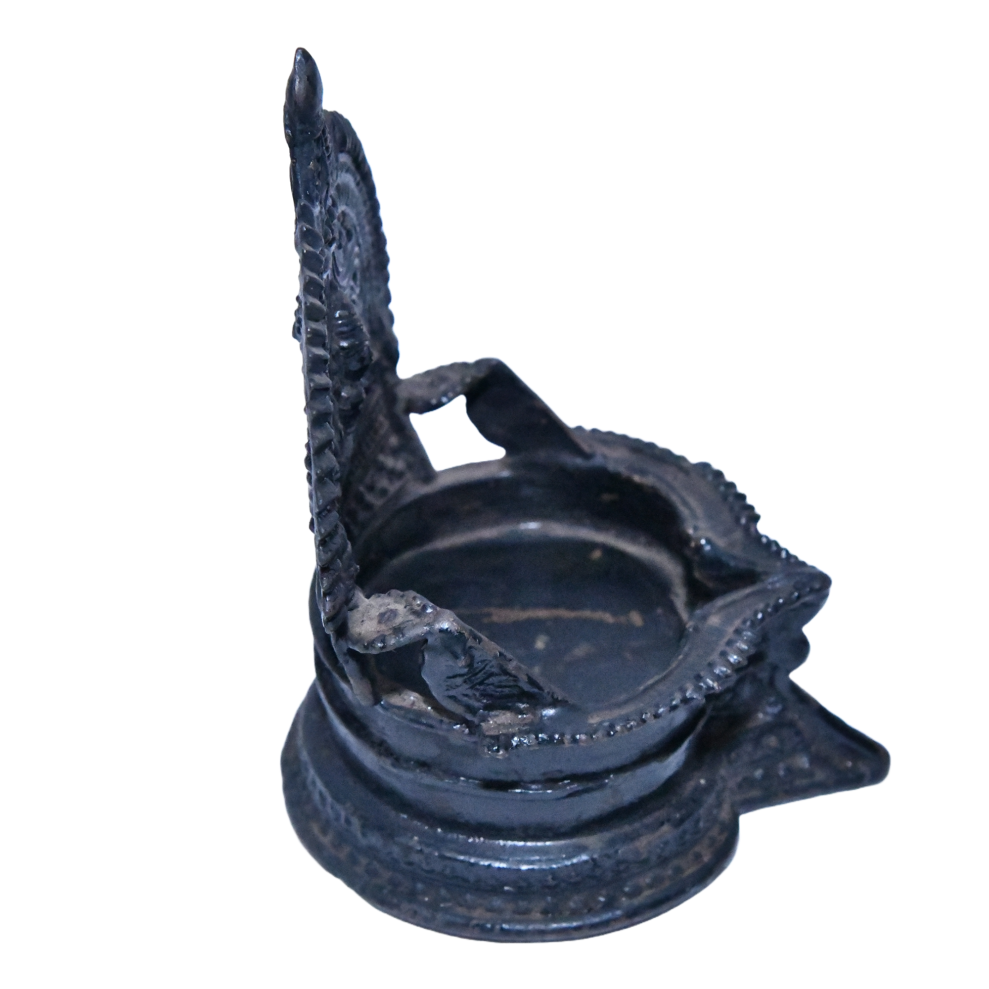 A late 19th-century brass Indian oil lamp depicting the goddess Lakshmi.