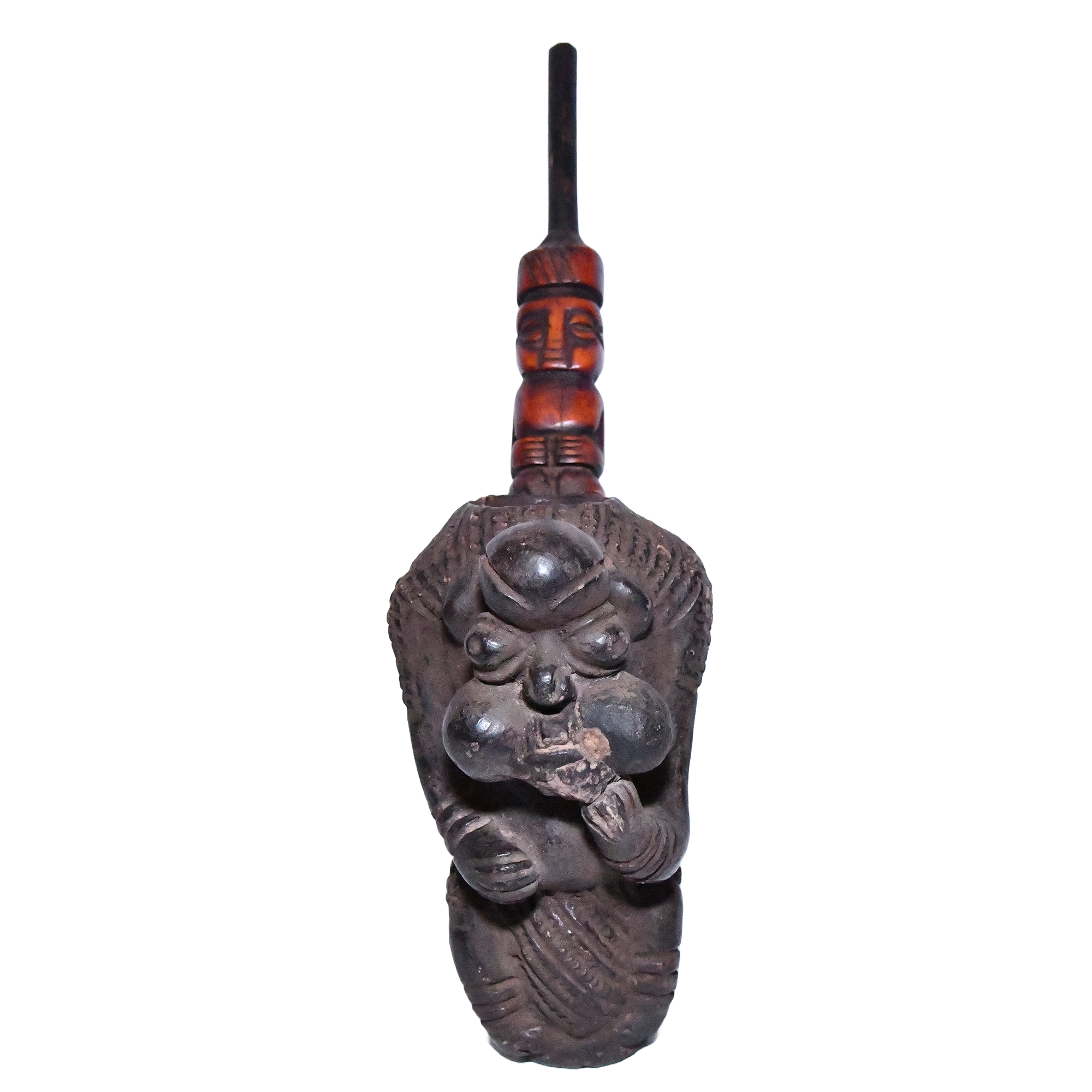 Bamum terracotta pipe bowl. It's a small, round bowl with intricate carvings.