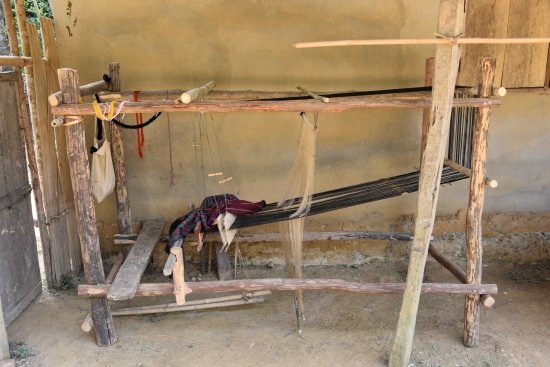 Traditional wooden handloom weaving in Laos