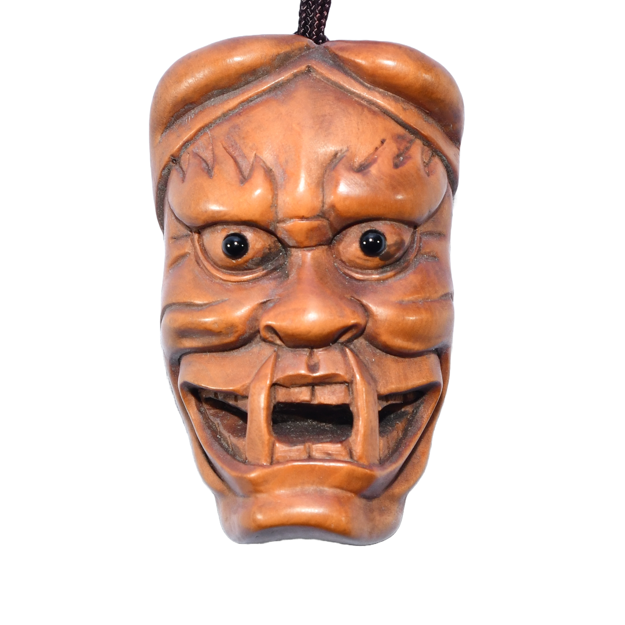 19th-century Japanese inro with erotic carvings, accompanied by an early-20th-century boxwood oni netsuke.