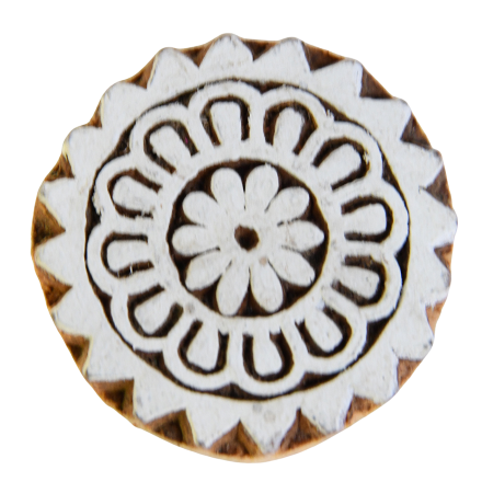 Small, hand-carved wooden Indian printing blocks featuring floral designs.