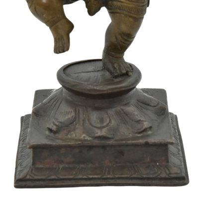 Antique bronze Ganesh statue dancing close up back view.png