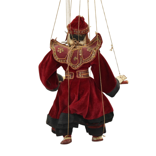 back view of an antique burmese puppet.png