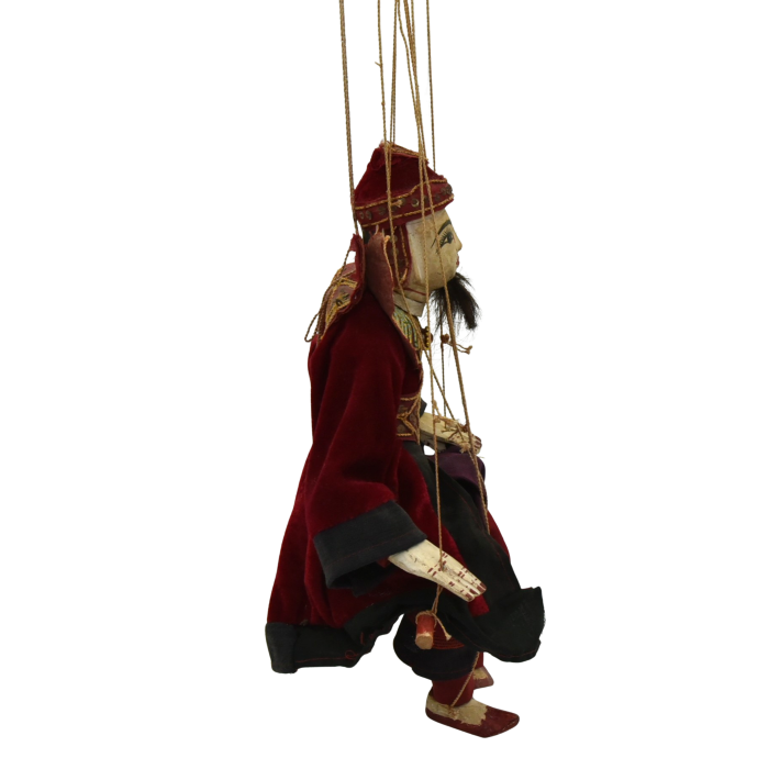 antique burmese puppet facing east.png