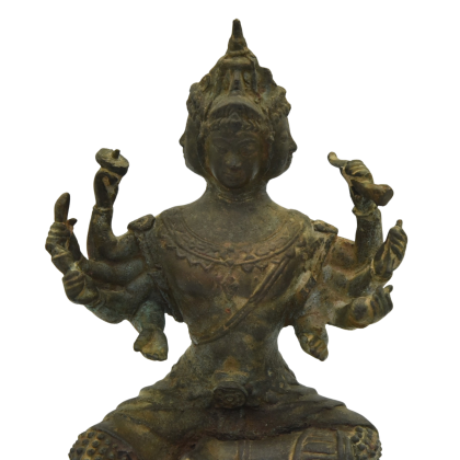 Front view close up of a antique bronze statue of Brahma.png