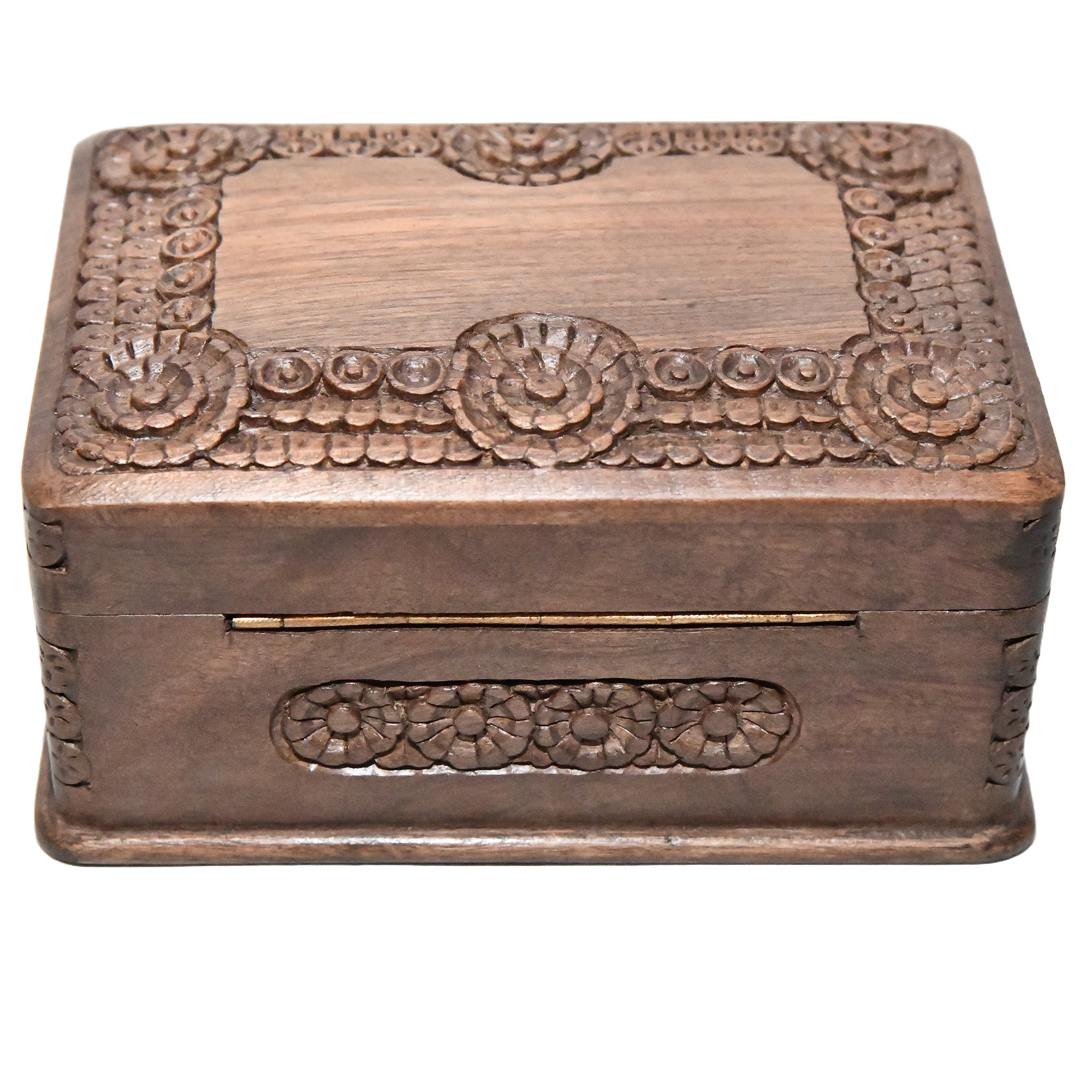 Handmade Kashmiri walnut jewellery secret box. It's a small, intricately carved box made of walnut wood.