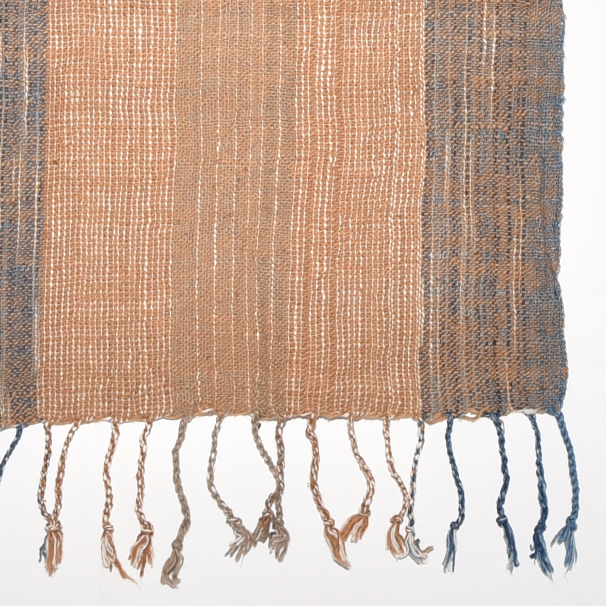 Hand spun, hand dyed and hand woven thick organic cotton striped scarf with brown, tan, indigo, and white, with tassels at each end. Measures 2m x 38cm.