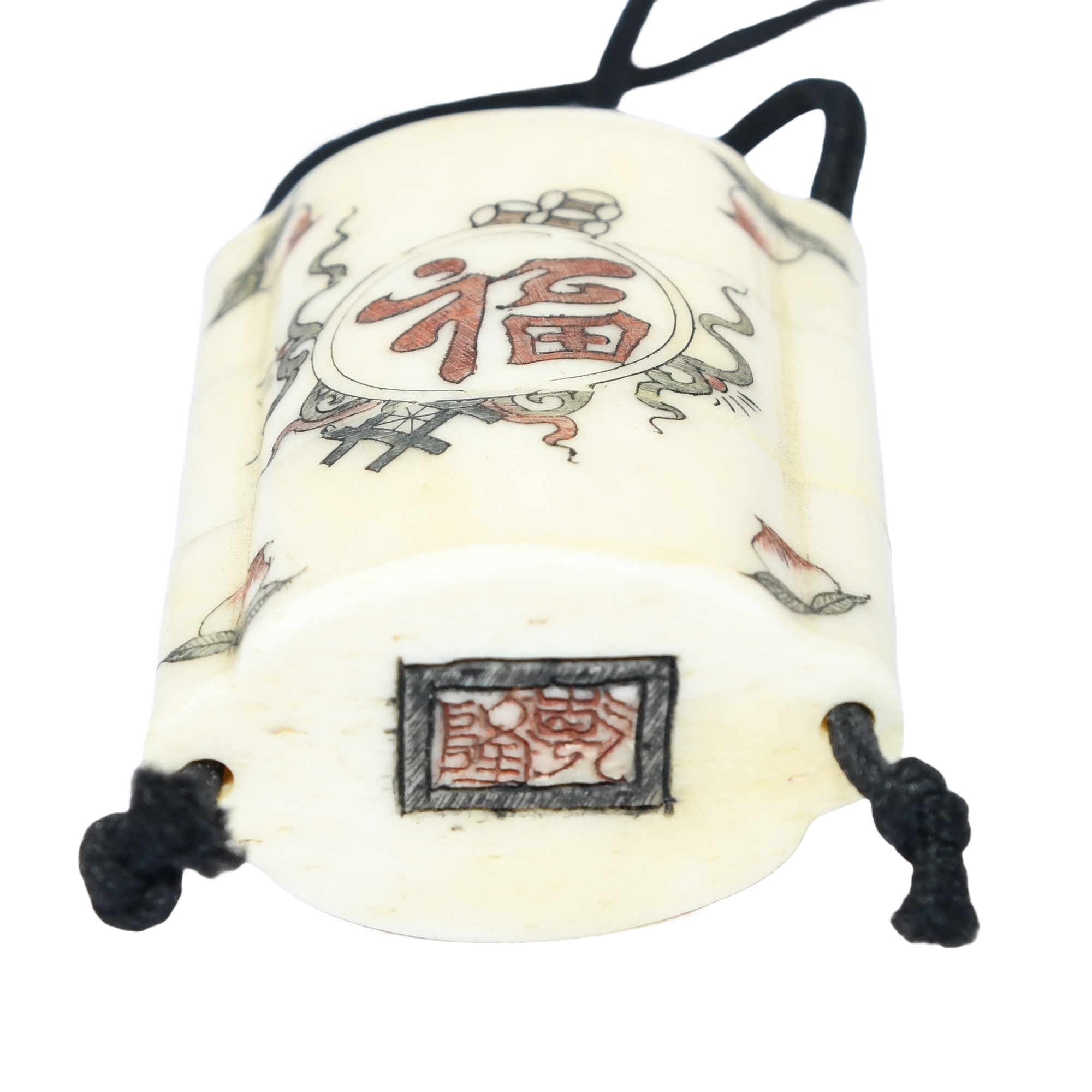 A meticulously crafted Japanese bone inro with two compartments, featuring Japanese calligraphy and an A ojime fastener.