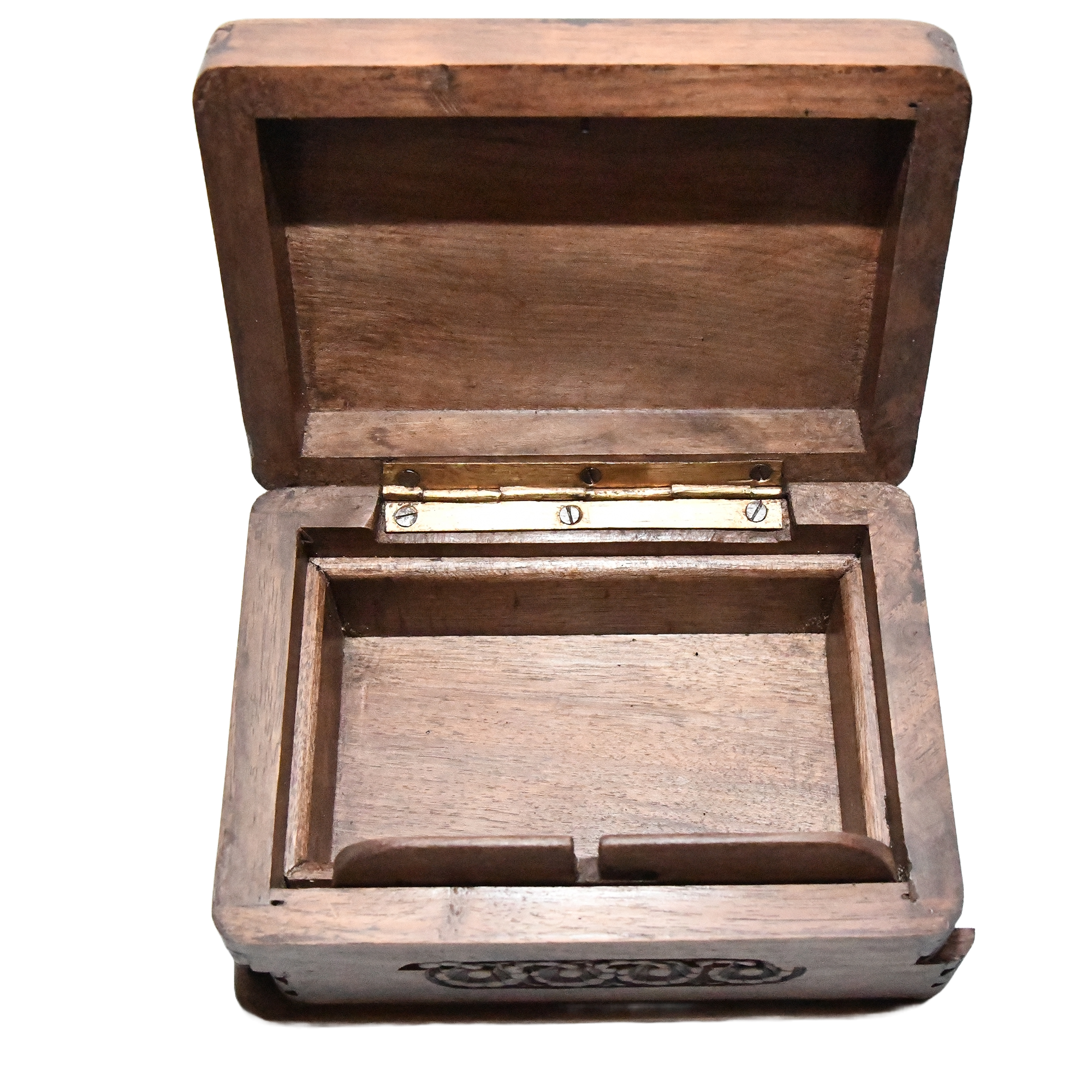 Handmade Kashmiri walnut jewellery secret box. It's a small, intricately carved box made of walnut wood.