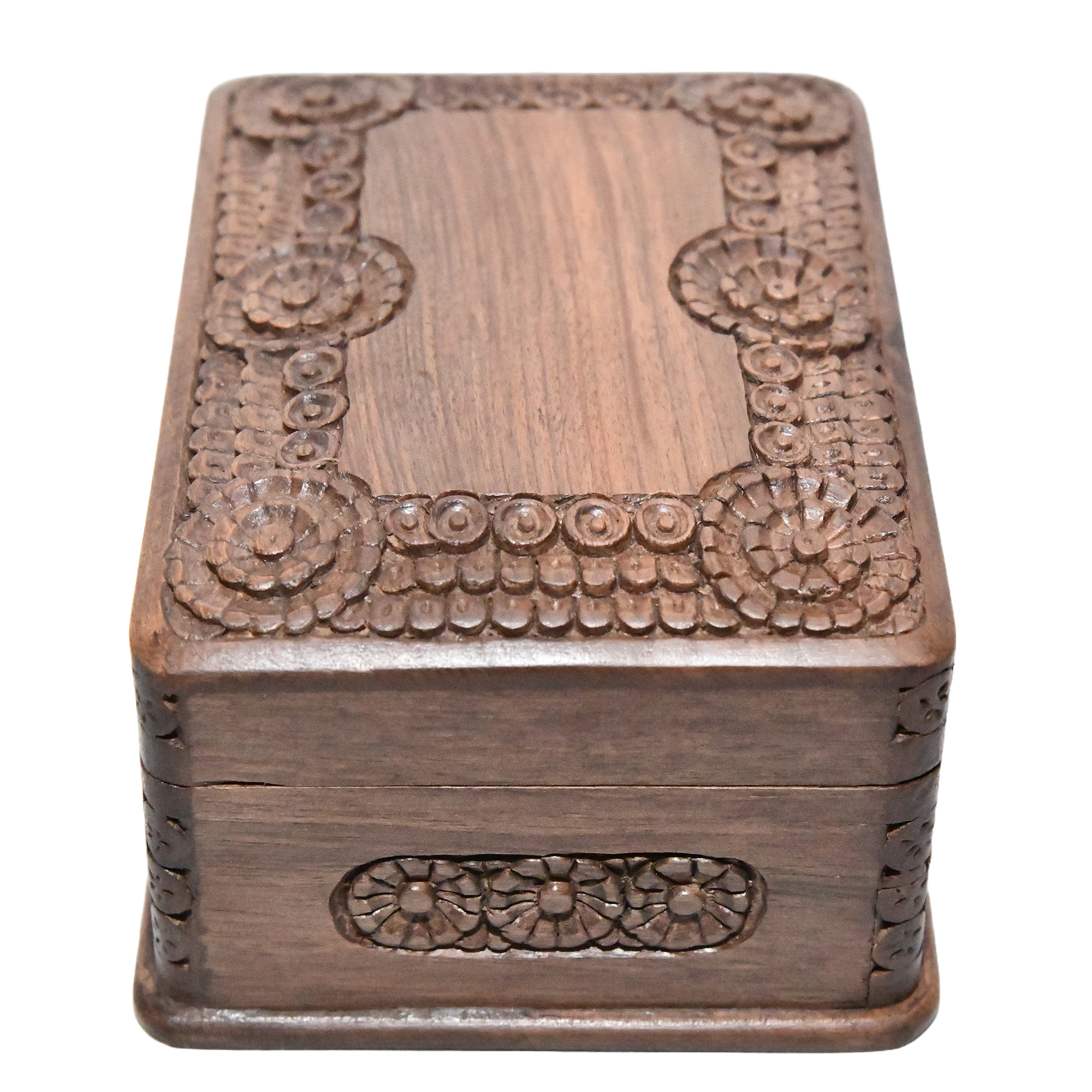 Handmade Kashmiri walnut jewellery secret box. It's a small, intricately carved box made of walnut wood.
