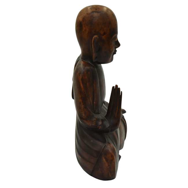 wooden seated buddha looking right.png