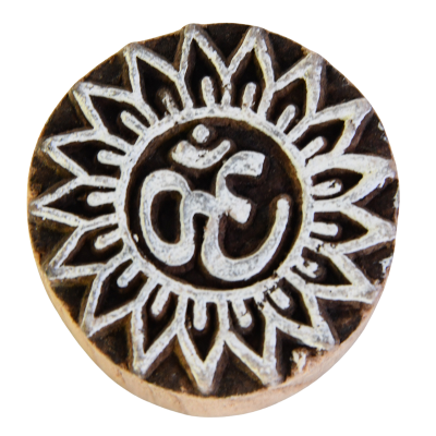 Small hand-carved Indian wooden printing block with the sacred 'Om' symbol.
