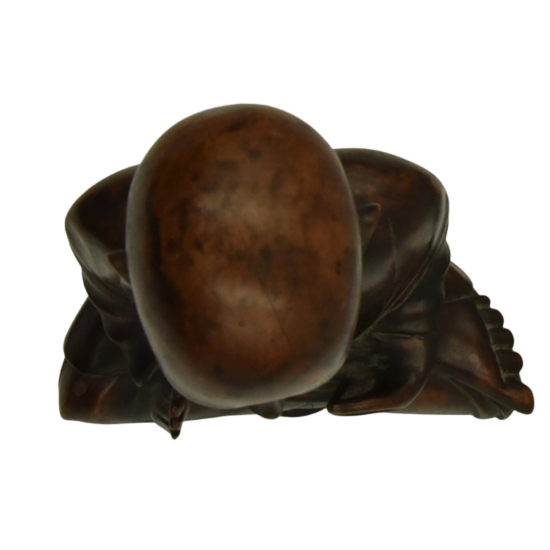 Seated wooden buddha top view.png