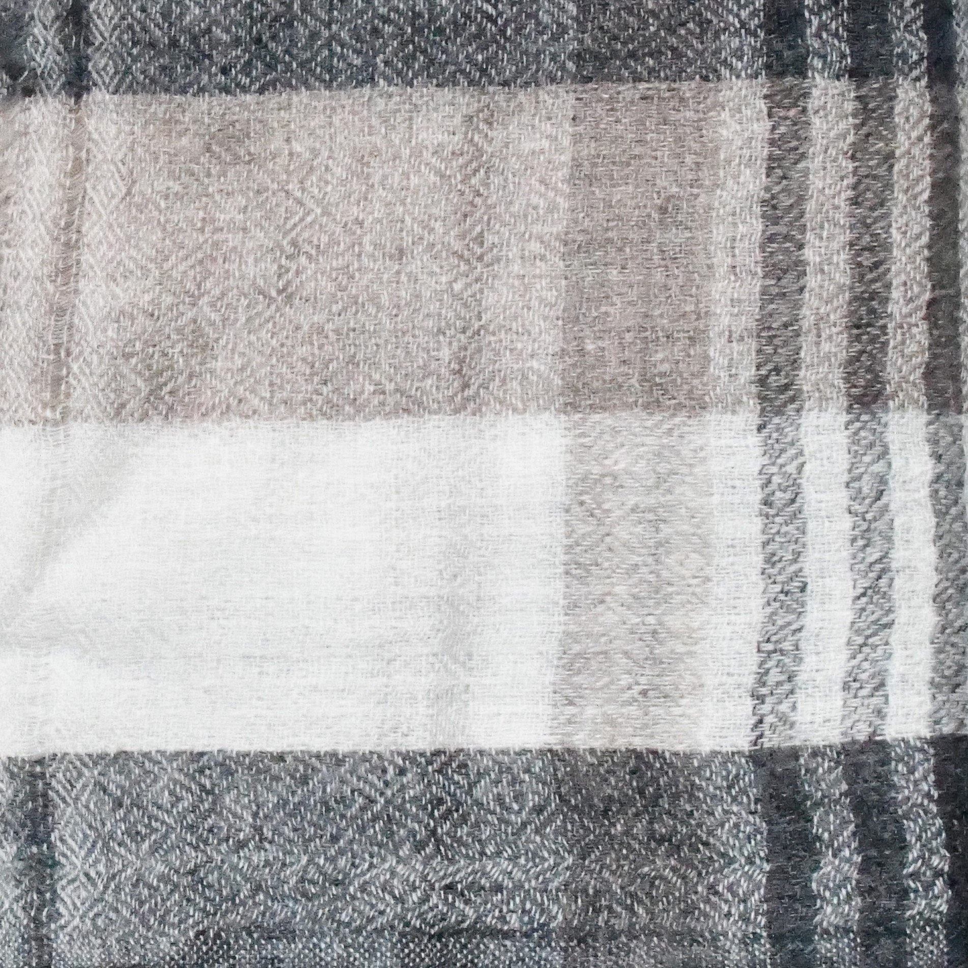 Authentic handwoven Nepalese cashmere pashmina shawls, showcasing the finest craftsmanship from the Himalayas.