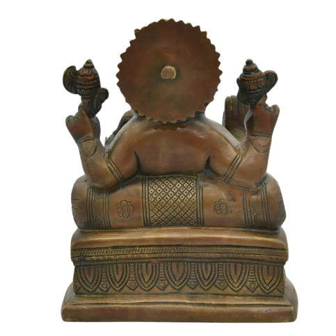 "Close-up of a hand-cast brass Ganesha statue featuring a rich antique bronze finish and intricate traditional carvings