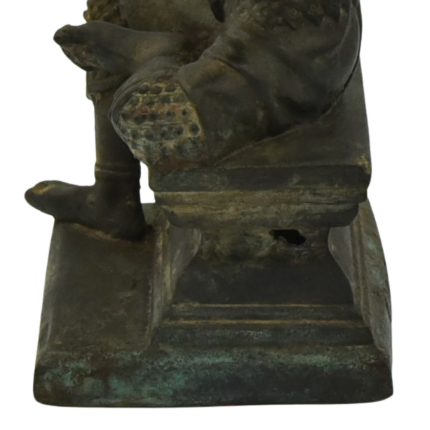 oxidisation on base view of a antique bronze statue of Brahma.png