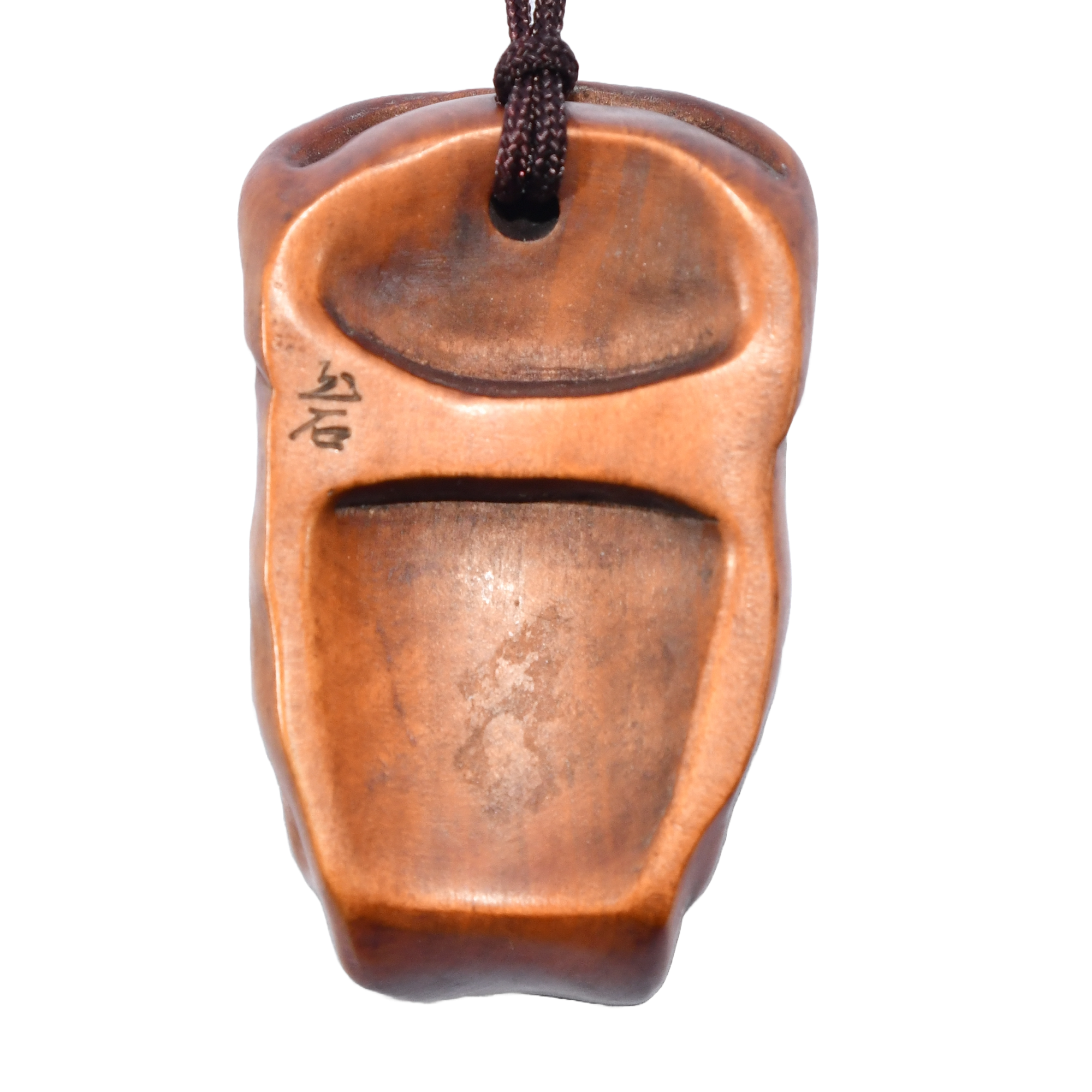 19th-century Japanese inro with erotic carvings, accompanied by an early-20th-century boxwood oni netsuke.