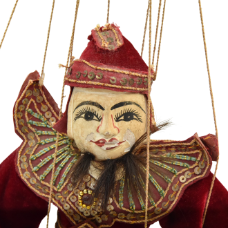 Front view of an antique burmese puppet  close up.png