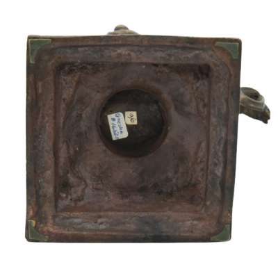 Antique bronze Ganesh statue dancing inside base view.png