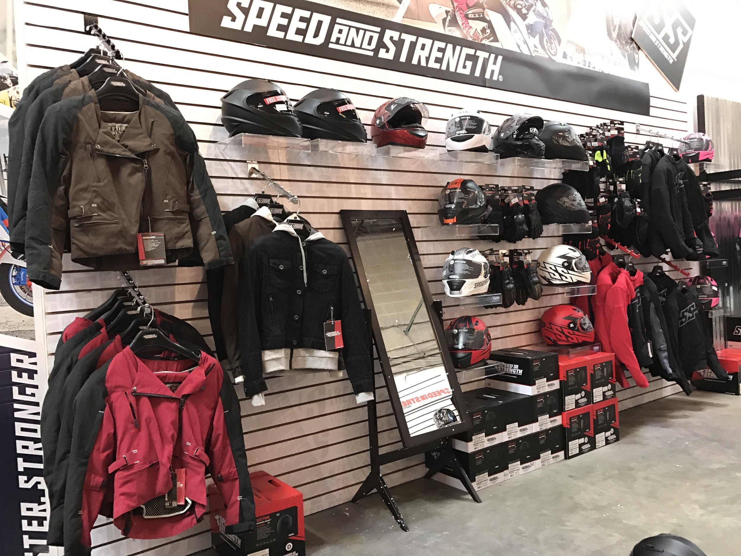 Apparel displays at the front of the showroom