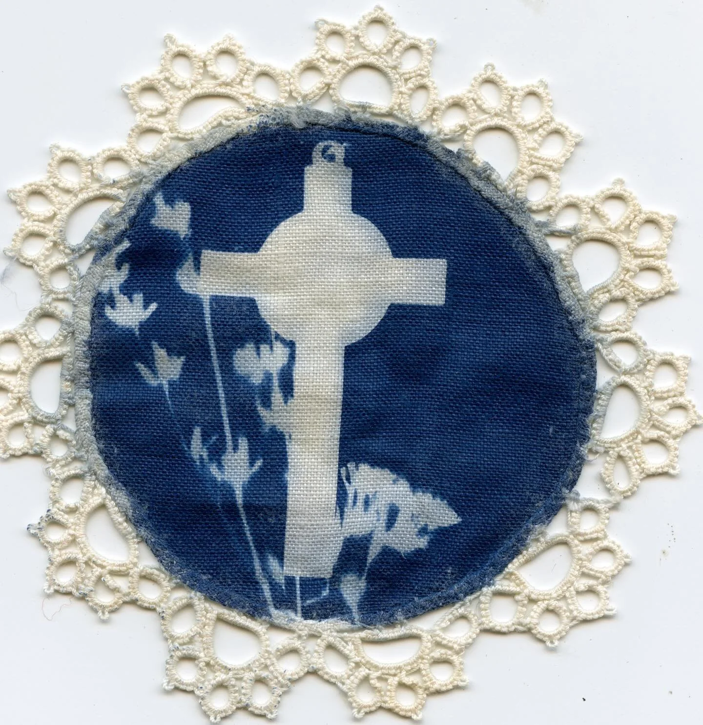 Cyanotype of dried flowers &amp; crucifix on a doily 
. 
.
I&rsquo;ve really been pushing myself to experiment with the materials I create with. As a photographer, I often felt limited by the traditional boundaries of the medium, especially growing u