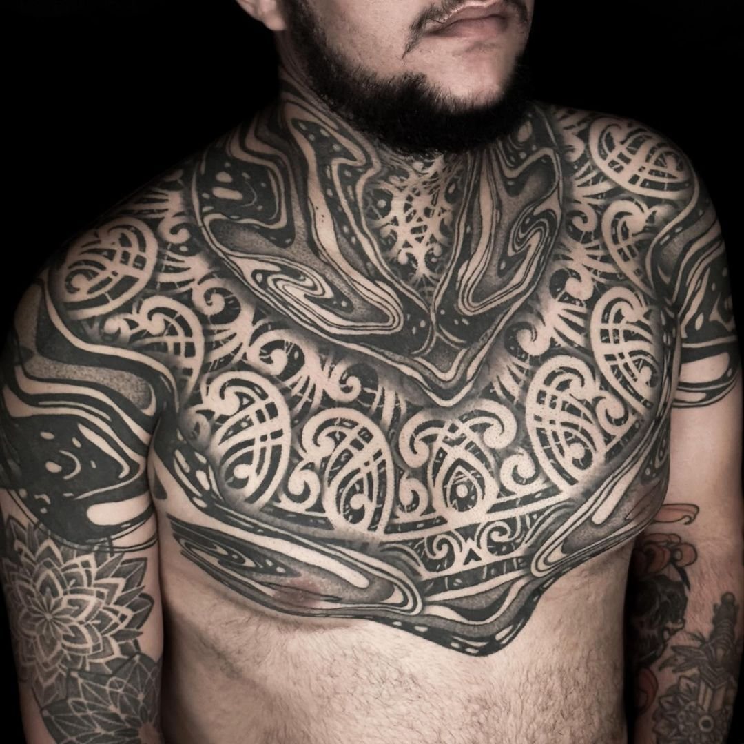 geometric chest tattoo europe