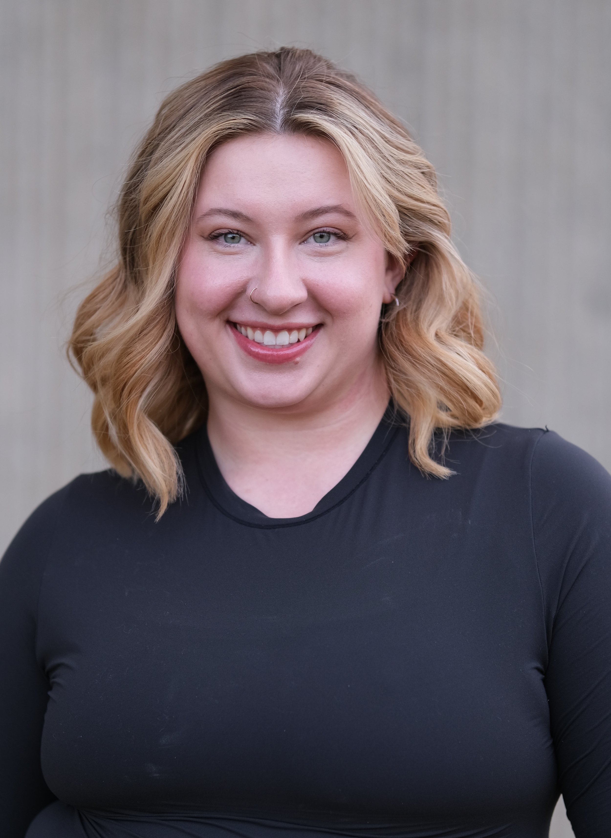 smiling headshot.jpeg