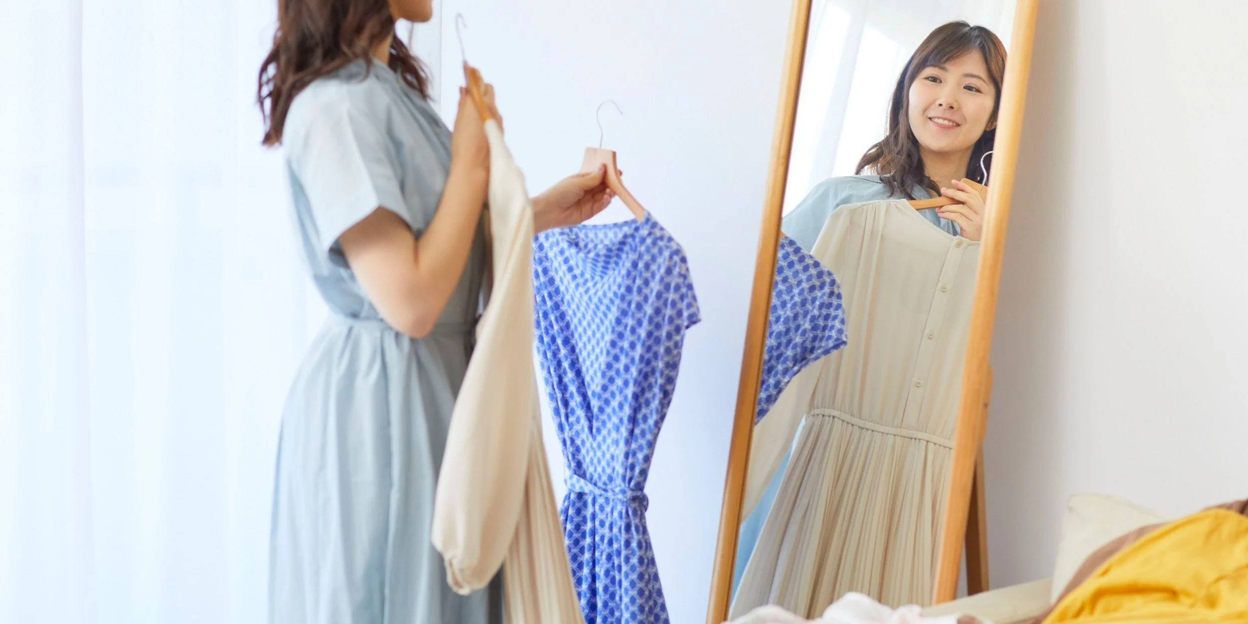 Woman choosing a professional outfit that aligns with her personal brand