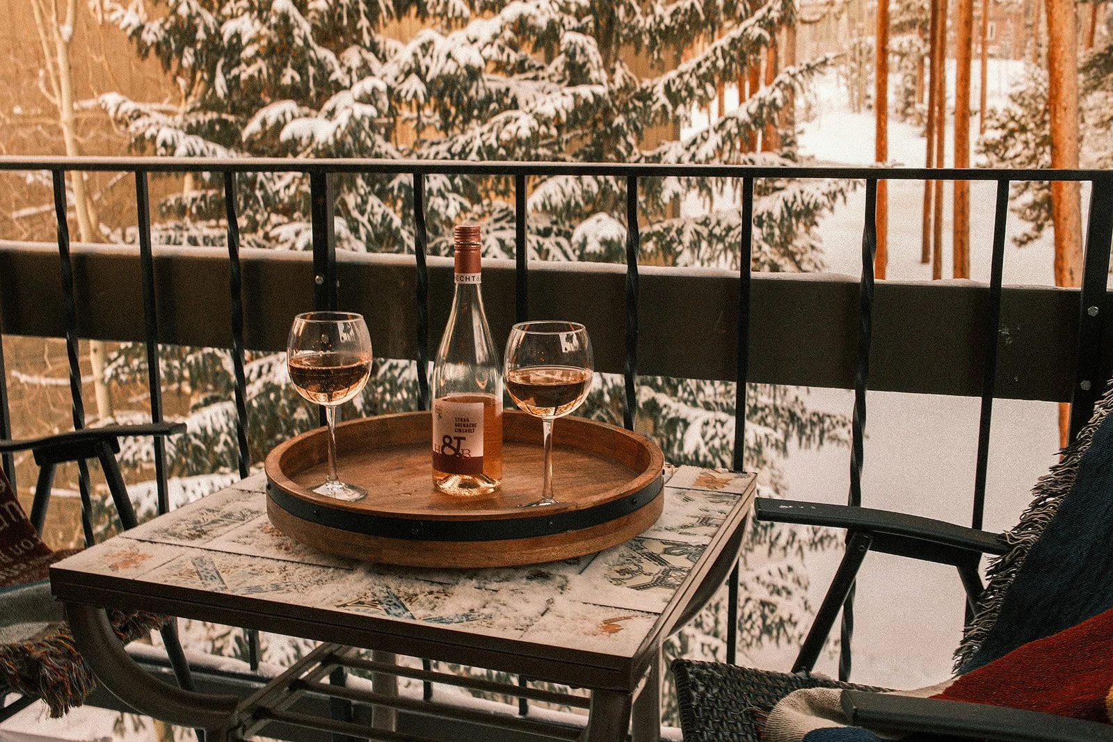 wine and snow at a breckenridge airbnb