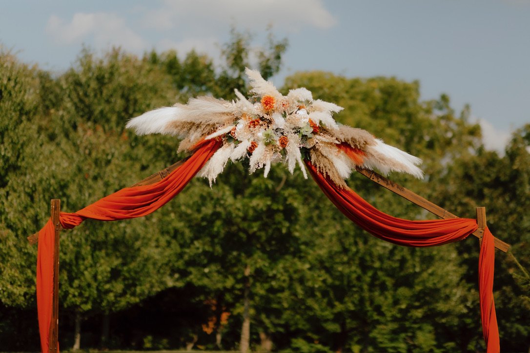 This beautiful fall arch floral is $400.00 rental.