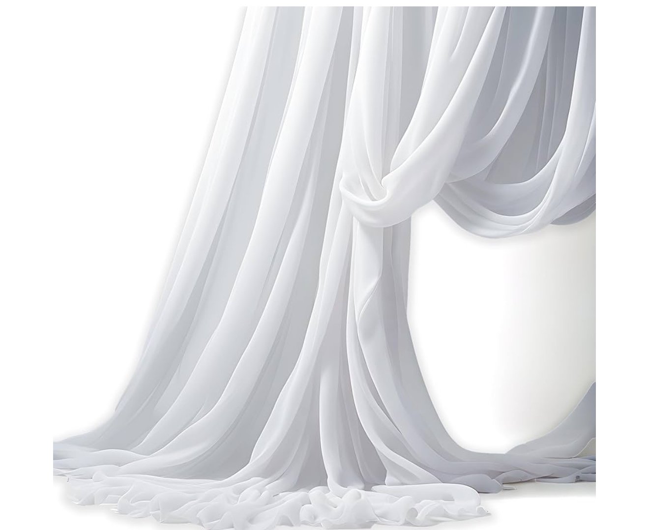 Elegant white sheer curtains draped on a floor.