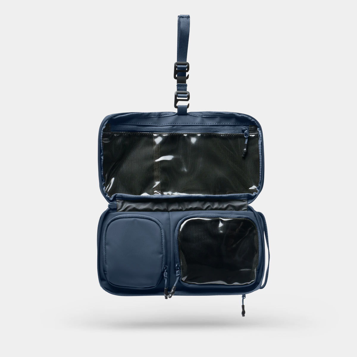 ACTBSM-NVY-03_ToiletryBagSmall_Navy_NOMATIC_01.png