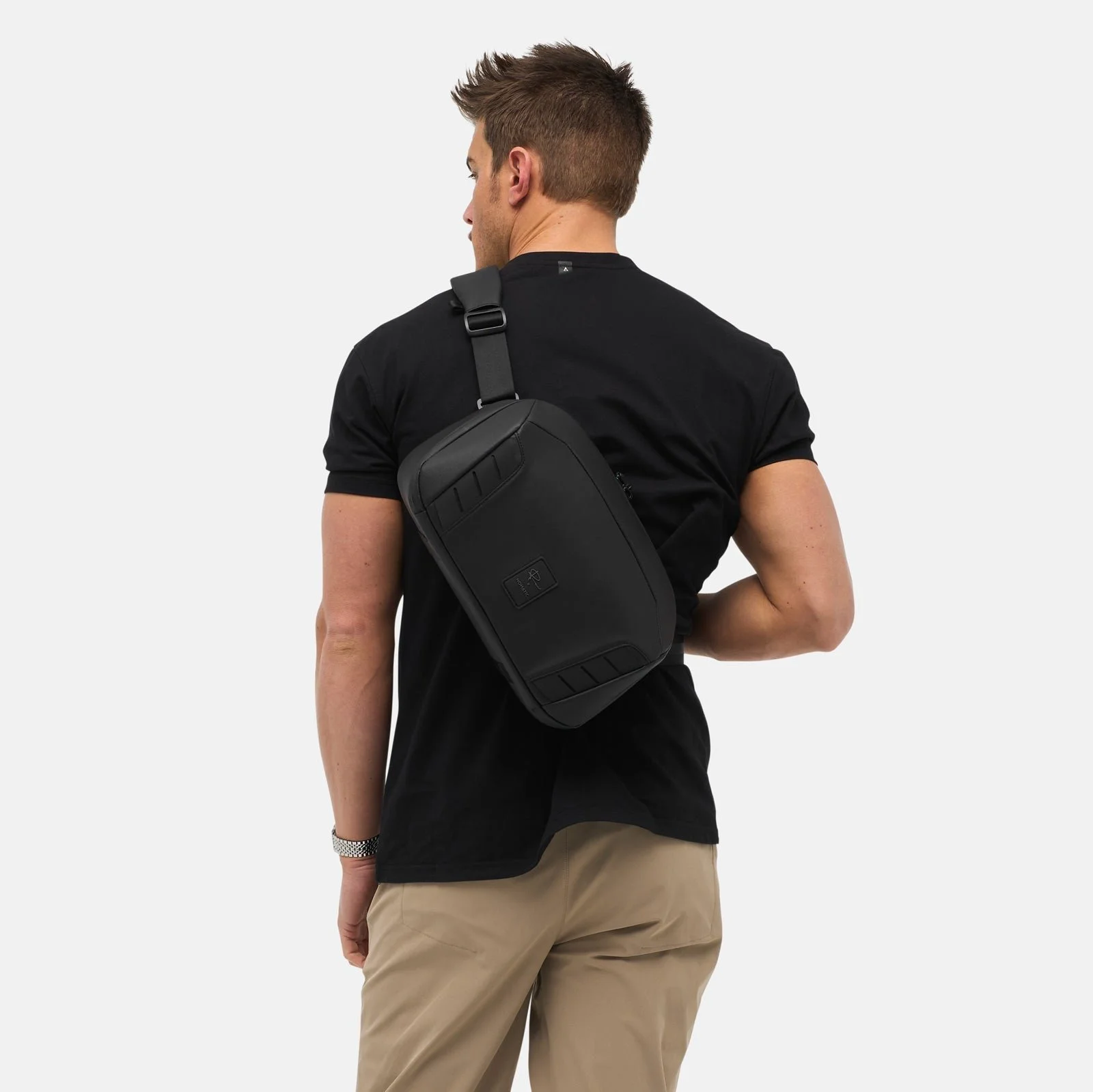 On-Model-Over-Shoulder-On-Back-McKinnon-Sling-8L-V2_Black_NOMATIC.jpg
