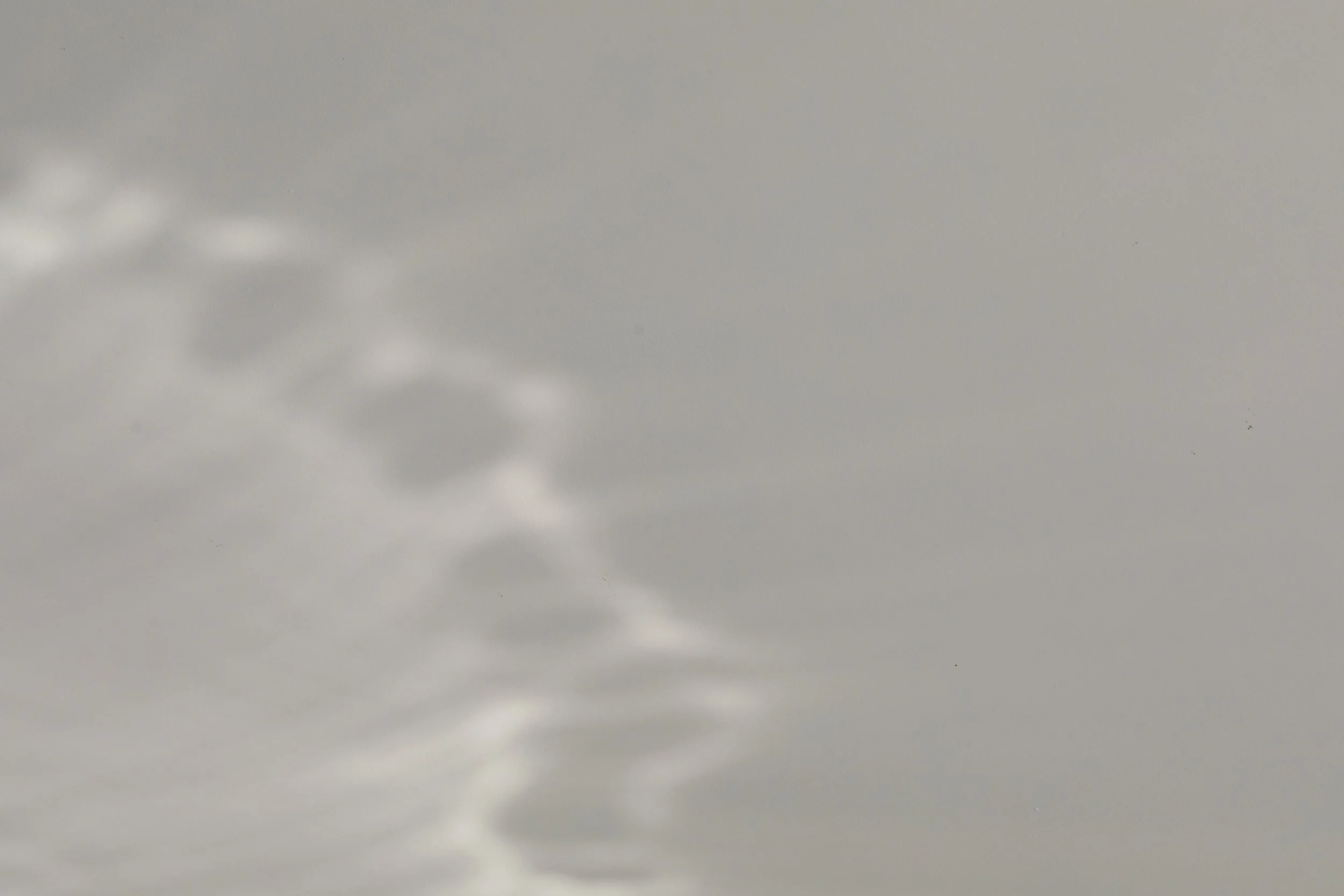 abstract light pattern with soft gray and white hues