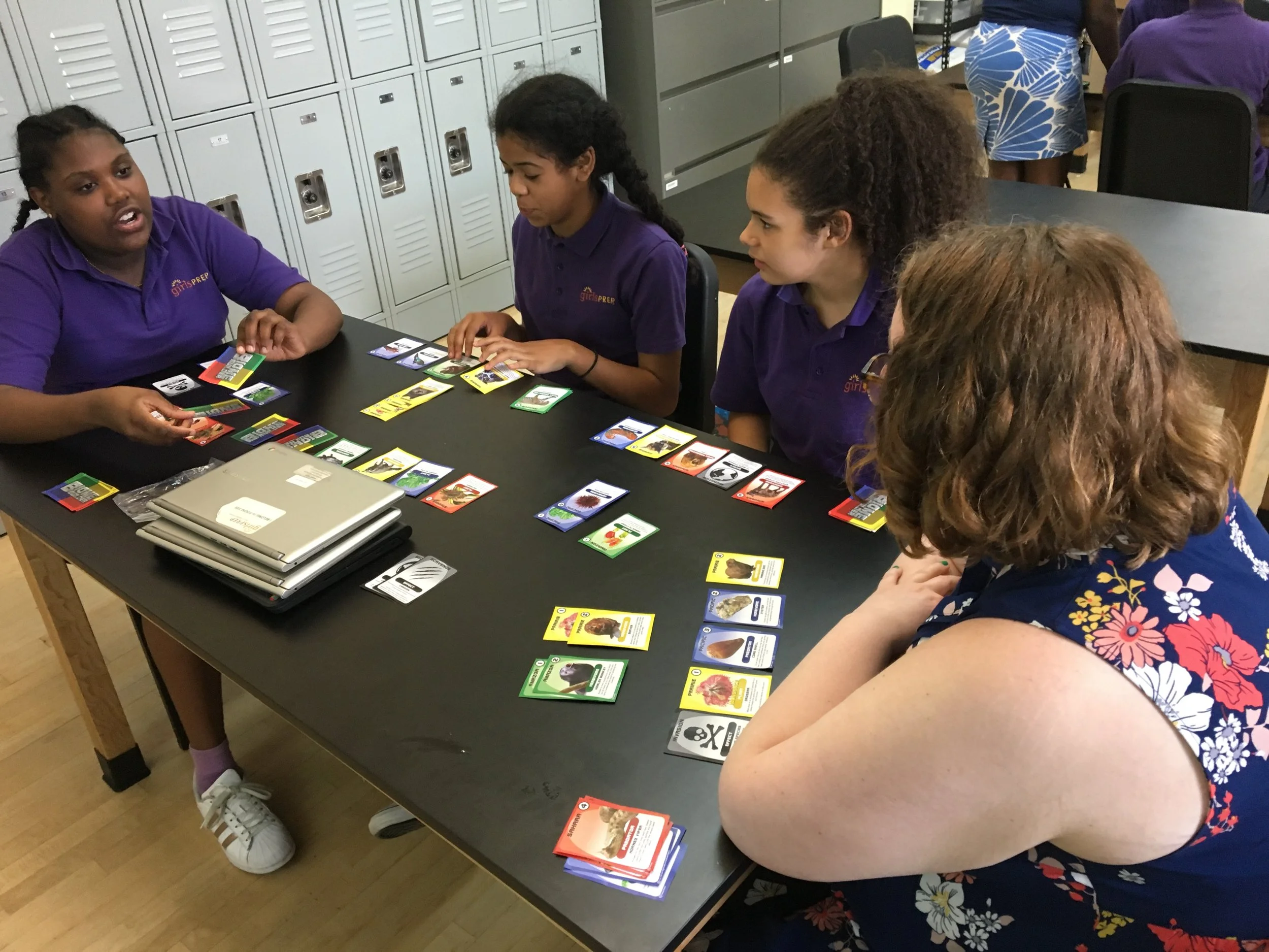 game creater and designer noelle playtesting with girls prep students.JPG