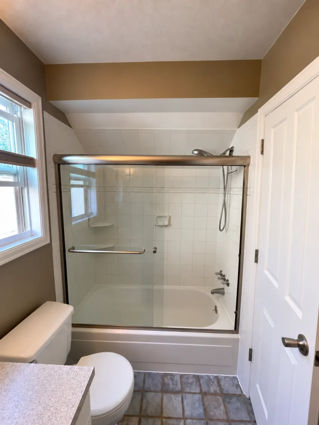 Bathroom awaiting remodel by Downy Home Remodeling in Boulder, CO with a bathtub to be converted to a shower