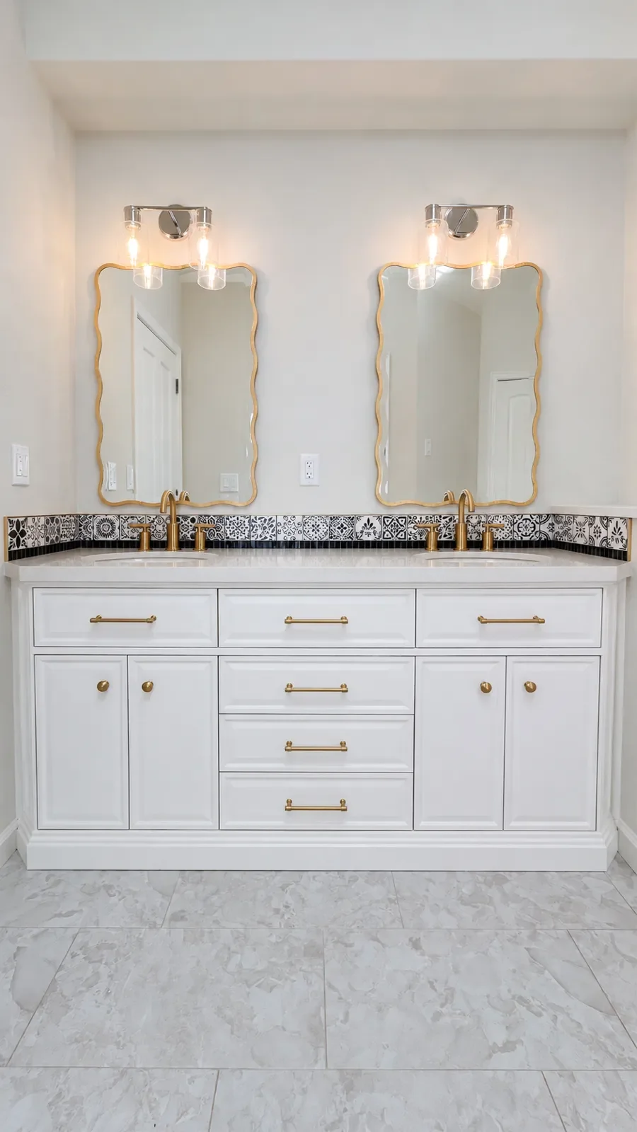 Gunbarrel, CO contemporary art deco bathroom remodel with custom white double vanity and gold fixtures