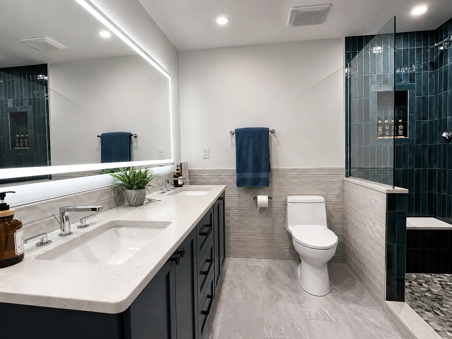 Newly remodeled bathroom in Chautauqua, Boulder, CO featuring spa upgrades- heated tile floors, heated toilet, walk-in shower with bench seating and three separate showerheads, and dimmable, temperature changing LED vanity mirror lighting